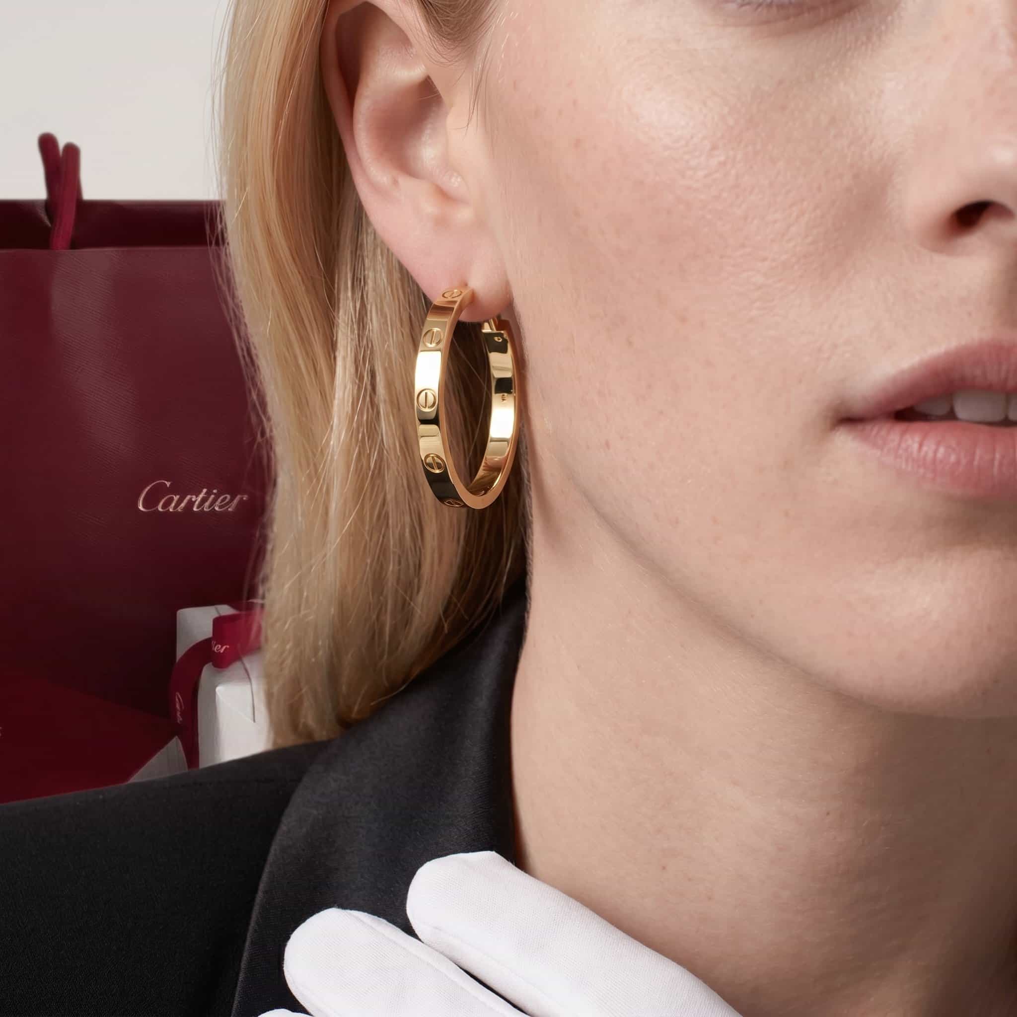 Cartier Золотые серьги-кольца Cartier Love, крупная модель