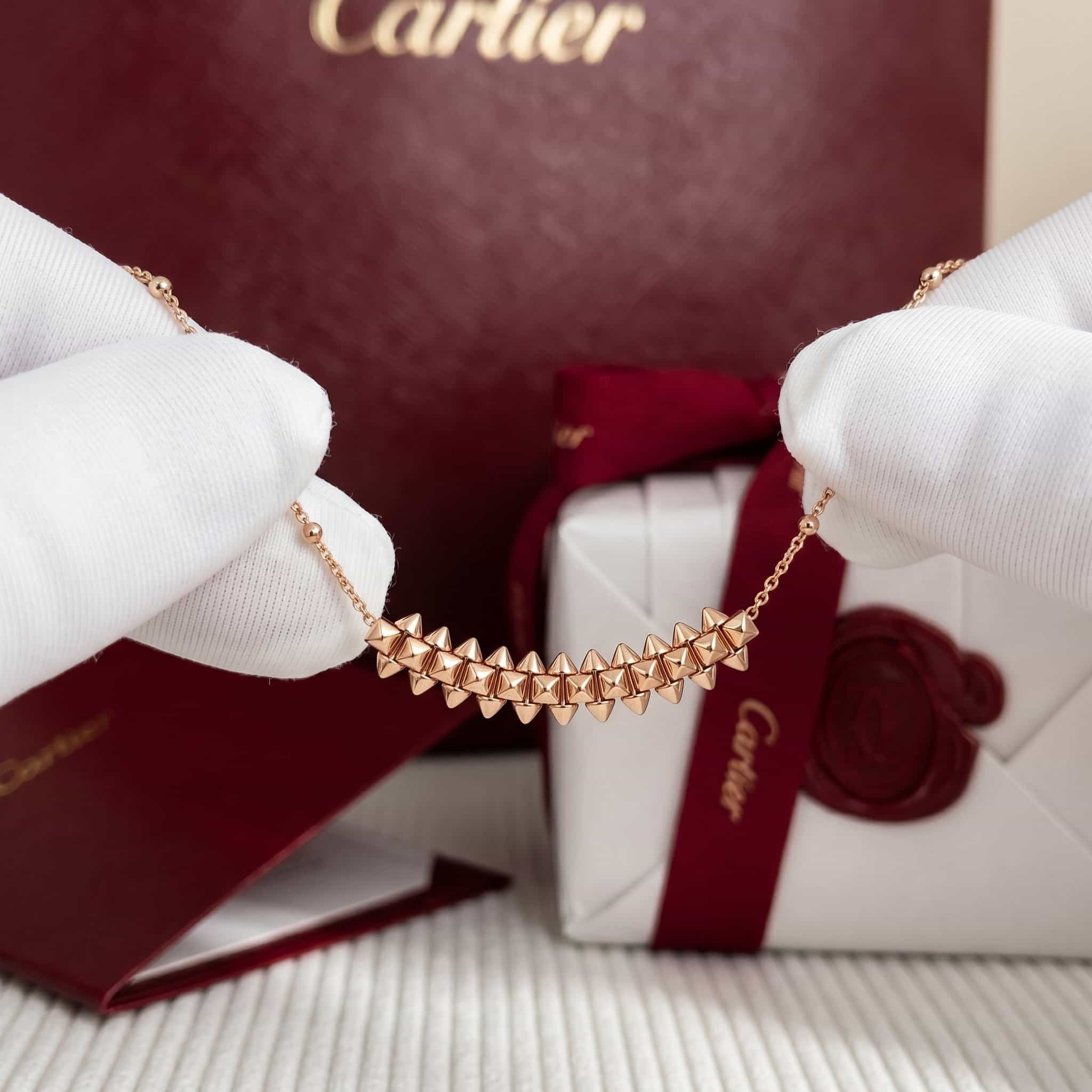 Cartier Золотая подвеска Cartier Clash, средняя модель