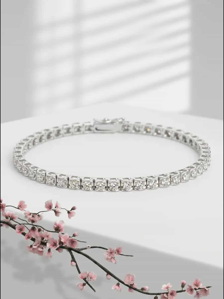 DIAMDOR Золотой теннисный браслет с бриллиантами