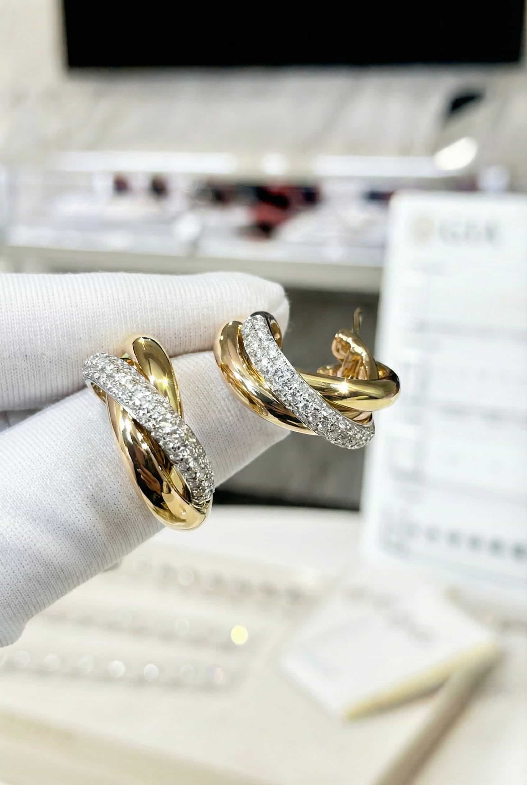 Cartier Золотые серьги Cartier Trinity с бриллиантами