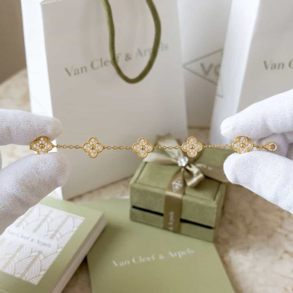 Van Cleef & Arpels Браслет Van Cleef & Arpels Vintage Alhambra, 5 мотивов, желтое золото, бриллианты