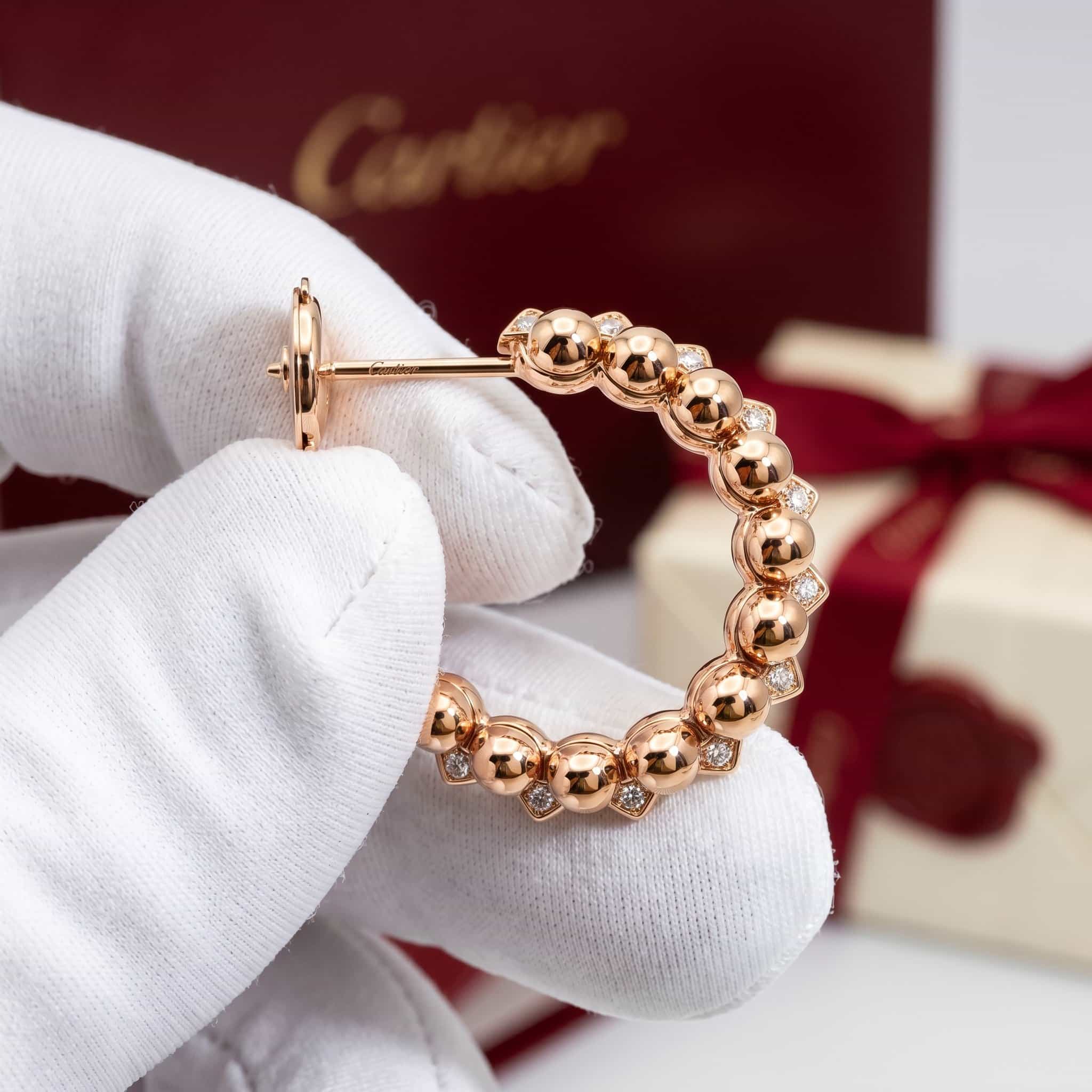Cartier Золотые серьги-кольца Cartier Clash с бриллиантами, малая модель, паве
