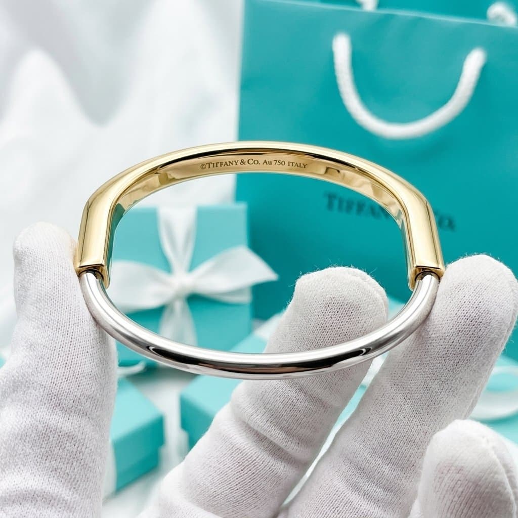 Браслет Tiffany Lock из желтого и белого золота