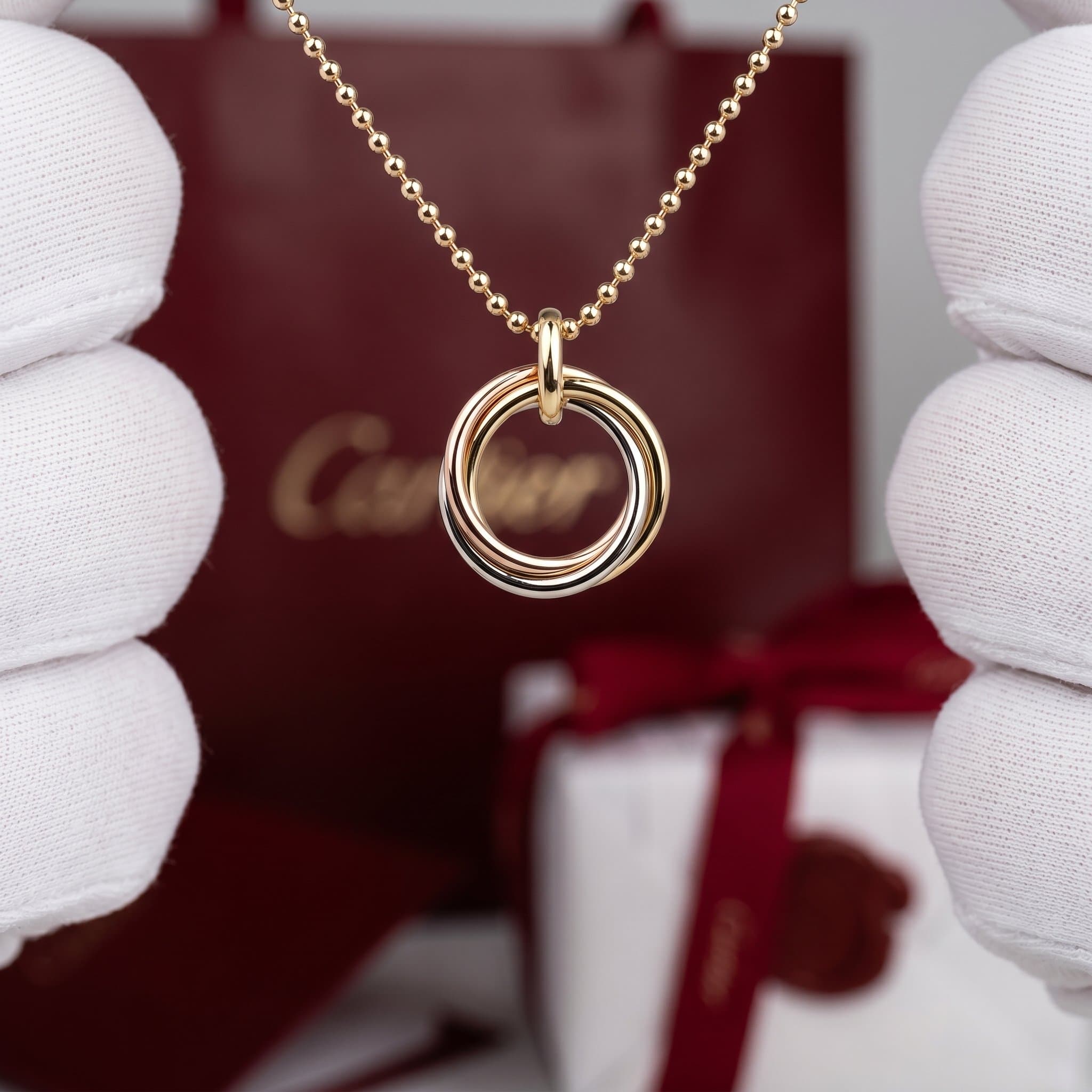 Золотая подвеска Cartier Trinity с бриллиантами, средняя модель, Белое и жёлтое золото