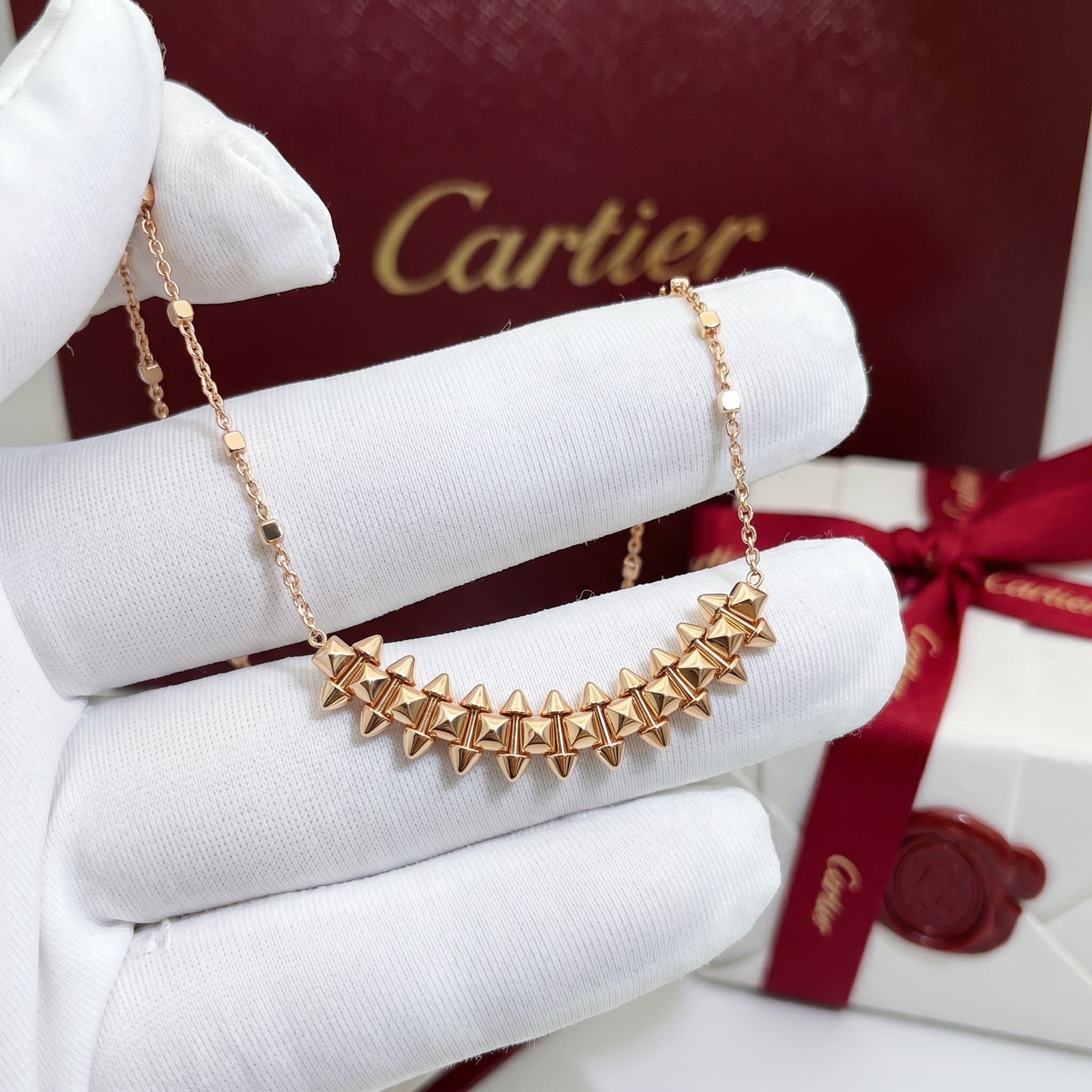 Золотое колье Cartier Clash