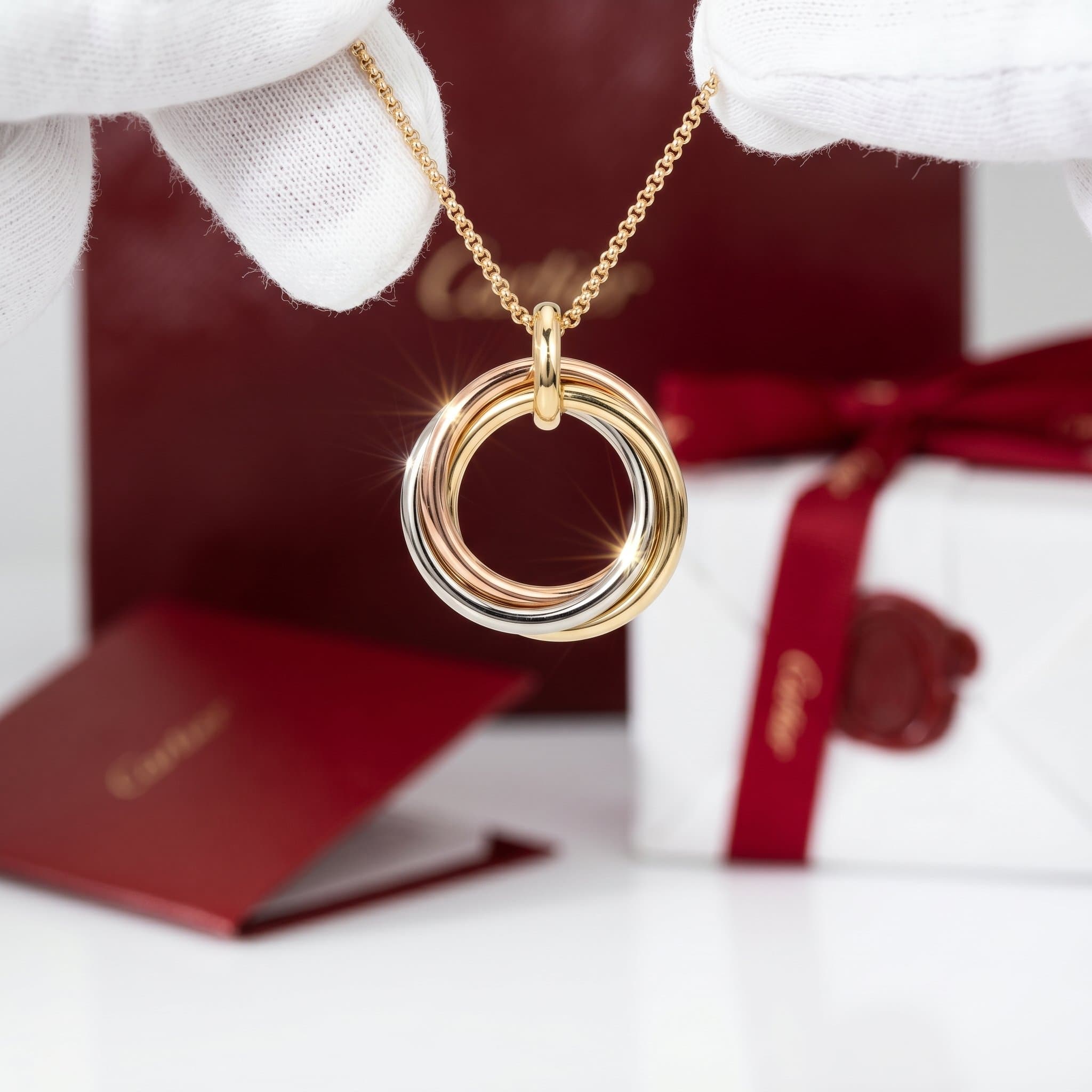 Золотая подвеска Cartier Trinity, крупная модель, Белое и жёлтое золото