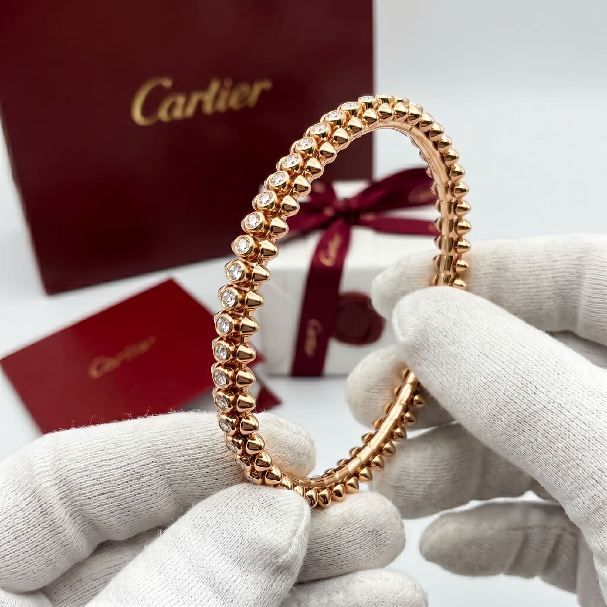 Золотой браслет Cartier Clash с бриллиантами, средняя модель — фото 4