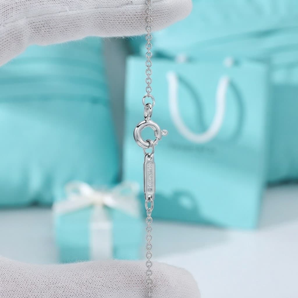Крест-подвеска Tiffany из платины с бриллиантами — фото 4