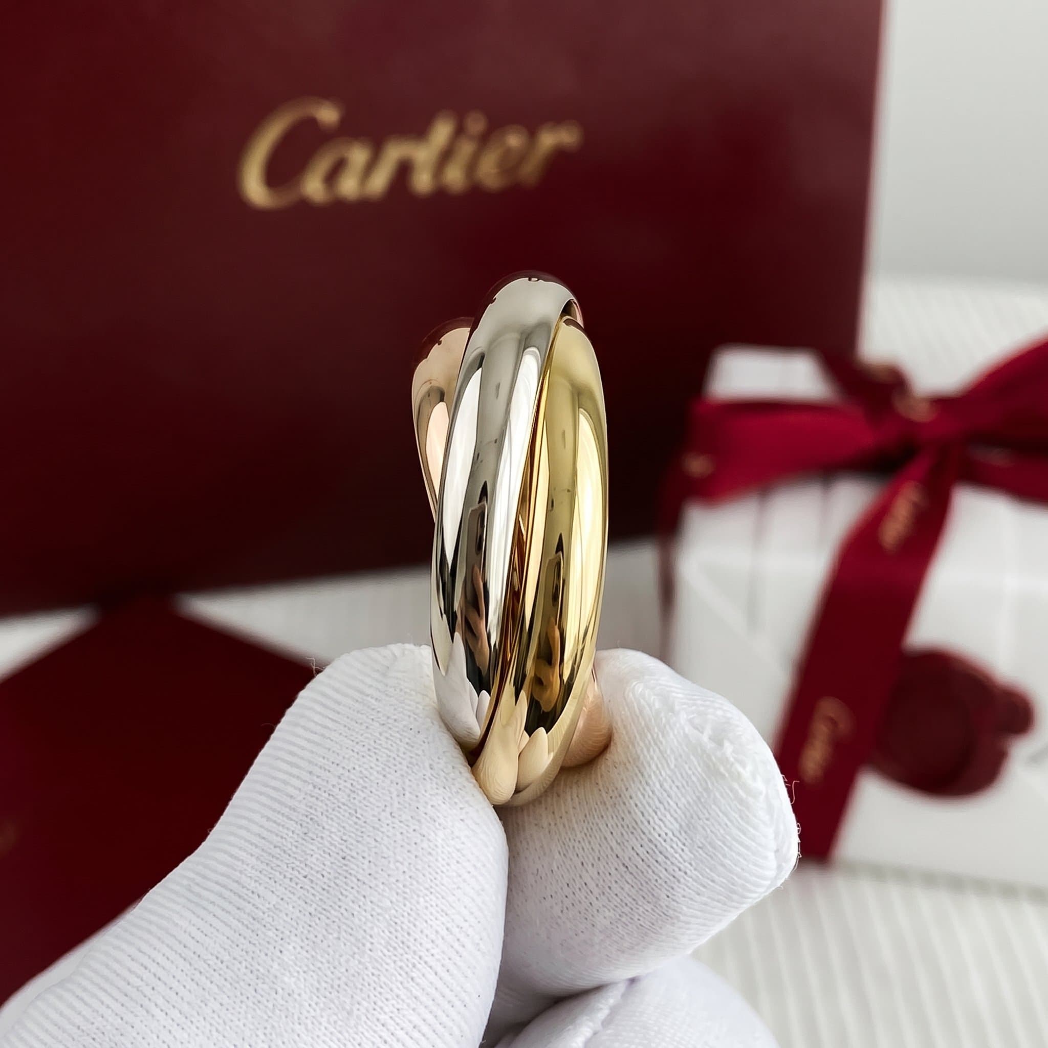 Золотые серьги Cartier Trinity — фото 2